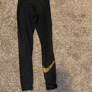 Nike gold Sparkly black leggings